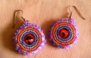 Contemporary style earrings using traditional Apsaalooke' beading methods. Courtesy of Kiley Molinari.