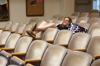 Kiley Molinari arrives early to choose the "best seat in the house" and settle in.